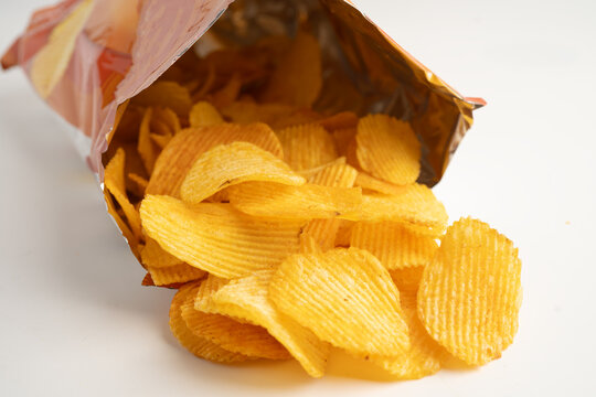 Potato chips delicious BBQ seasoning spicy for crips, thin slice deep fried snack fast food.