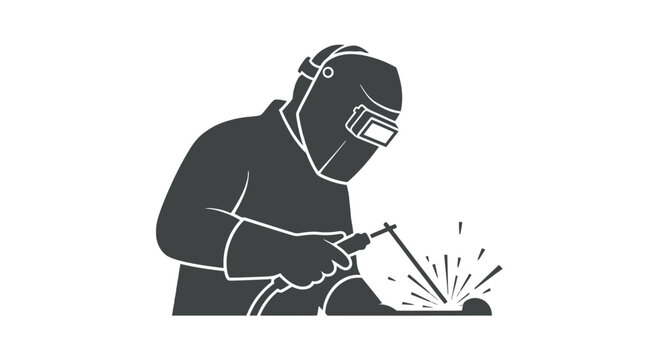 Welding Worker in Protective Gear Working.