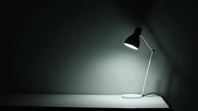 Minimal desk lamp casting soft pool of light dark minimal table, table light shadow minimalism