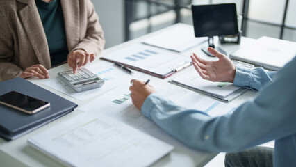 business man Auditor or internal revenue service staff checking annual financial statements company...