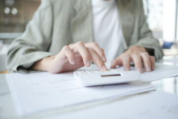 Fototapeta premium Auditor or internal revenue service staff, Business women checking annual financial statements of company. Audit Concept