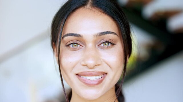 Headshot of Pretty Woman with Green Eyes and Clean Complexion Looking Direct. Concept of Female Facial Treatment and Youth. Cinematic 4K Slow Motion Video Shot With Shallow Depth of Field For Emphasis