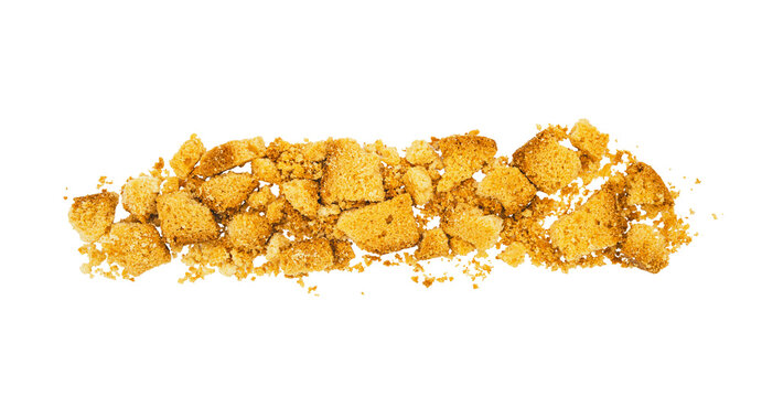 Pile of crushed golden cookie or cracker crumbs isolated on Transparent background, scattered texture for baking and food design.