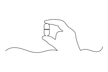 Fototapeta premium Capsule pill one line drawing of hand holding medication for healthcare