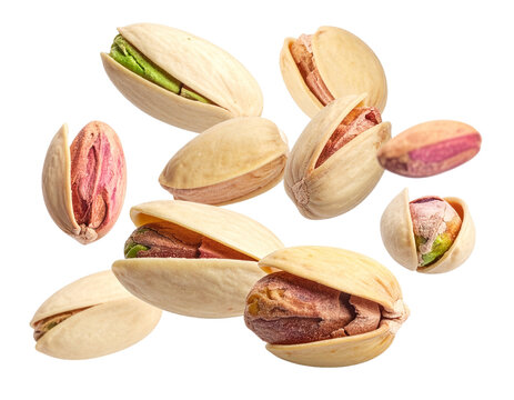 Fresh green pistachios falling dynamically isolated for graphic designers to design high-quality snack packaging on a transparent background to emphasize natural quality and crunchiness