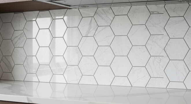 Hexagonal marble tile backsplash in a modern kitchen clean white surface with subtle veining for interior design and home renovation