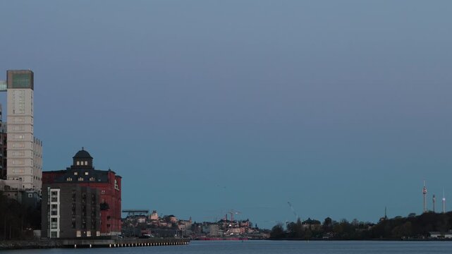 Stockholm, Sweden A sunrise view of the Kvarnholmen district and city skyline. 