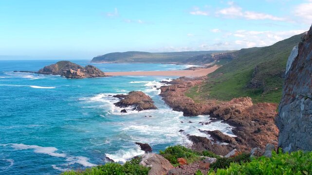 Epic seascape lookout point view toward The Island and tombolo, Robberg trail