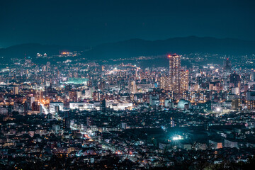 Obraz premium Hiroshima Night Cityscape with Dense Urban Skyline
