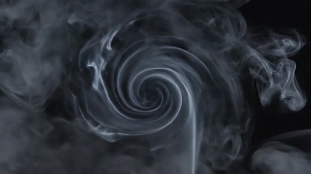 A cloud of white smoke rises against a dark background, creating an abstract and mysterious visual effect, perfect for various design projects
