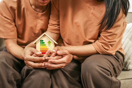Home improvement concepts, home energy efficiency, eco-friendly home improvements, cost savings and green energy costs, green buildings for sustainable development.