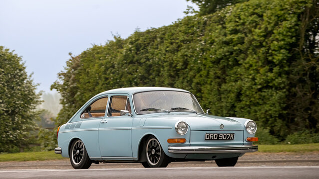 Bicester,Oxon.,UK - Apr 26th 2026:  1972 blue Volkswagen Type 3 fastback classic car driving on a British road