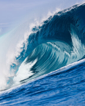 Powerful Teahupoo wave curling into a barrel in Tahiti