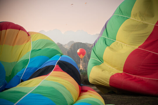 Colorful hot air balloon over Vang Vieng Laos at dawn