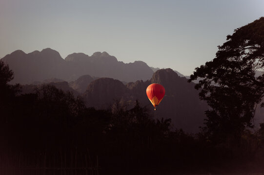 Colorful hot air balloon flight over Vang Vieng, Laos