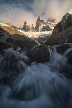 Poincenot and Fitz Roy peaks above river in Patagonia