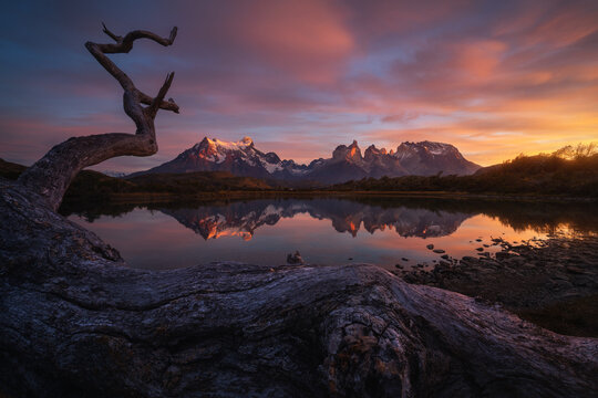 Sunrise reflection over Torres del Paine peaks, Patagonia