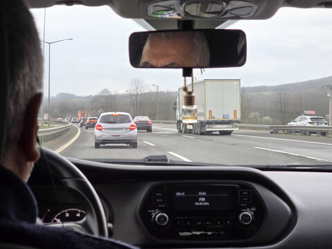 Driver view of busy highway traffic during road trip