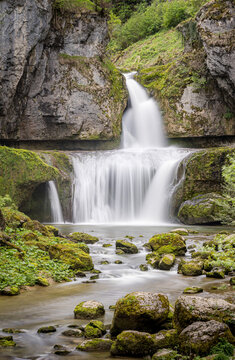 Long exposure waterfall and river in Lods, France gorge