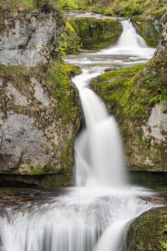 Long exposure waterfall and river in Lods, France canyon