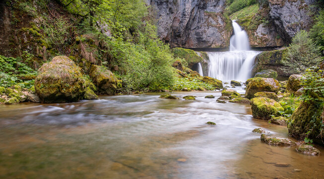 Long exposure waterfall and river in Lods, France gorge