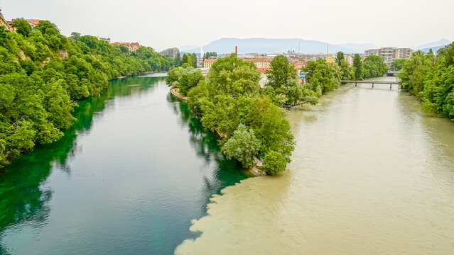 Confluence of two rivers in Lods France with city view