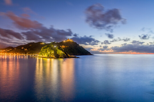 Sunset over Igueldo and Santa Clara Island in Spain