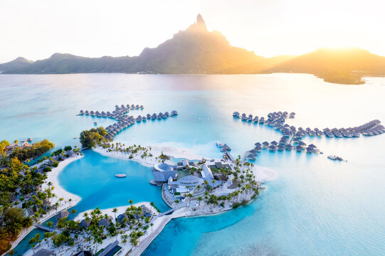 Aerial view of Bora Bora lagoon resort at sunrise