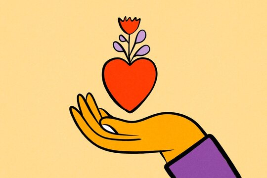 Hand holding growing heart icon for innovation concept