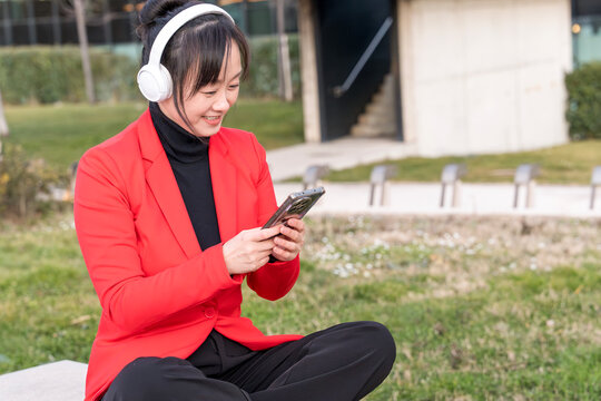 Middle-aged businesswoman enjoying leisure outdoors