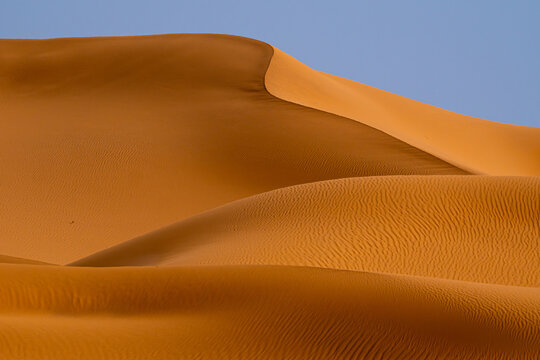 Golden dunes of the Sahara desert in Merzouga