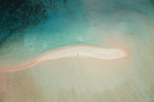 Aerial view of Maldives sandbar island in turquoise sea