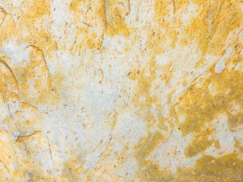 Abstract stone texture with natural ochre pattern backdrop