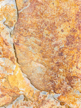 Abstract stone texture with natural rusty orange pattern