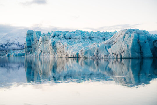 Vatnajokull glacier in Iceland reflected in calm lagoon