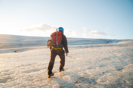 Glacier trekking on Vatnajokull in Iceland at sunrise