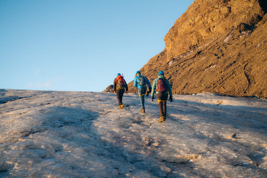 Glacier trekking on Vatnajokull in Iceland at sunset