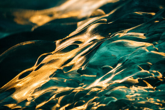 Golden light on ice textures at Vatnajokull, Iceland