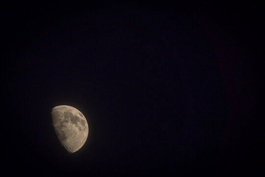 Moon against a serene night sky in celestial display