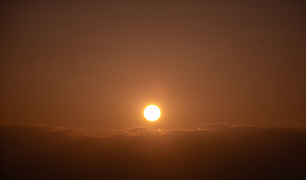 Golden hour sunset over tranquil horizon