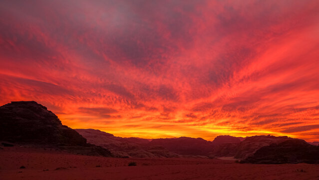 Vibrant desert sunset with dramatic sky colors