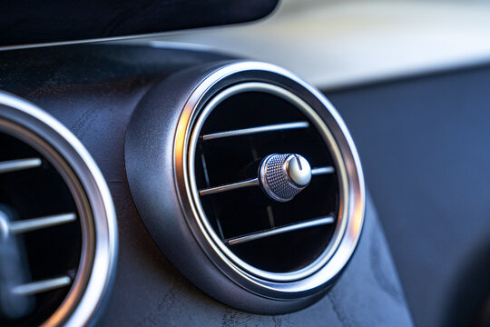 Close-up of modern car air vent and dashboard detail
