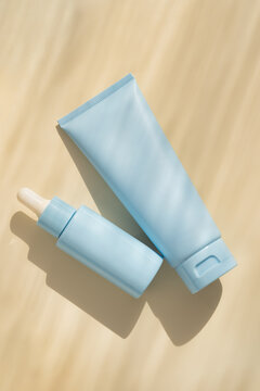 Minimal cosmetic packaging with serum bottle and cream tube