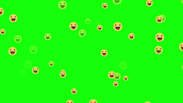 Yellow smiley faces float against a green screen