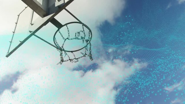Sportsman launching toward rim guiding ball through chain net to score, teal overlay accenting jump