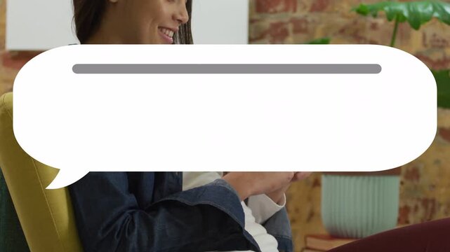 Woman holding phone tapping typing dots expanding into bubble with loader while checking messages