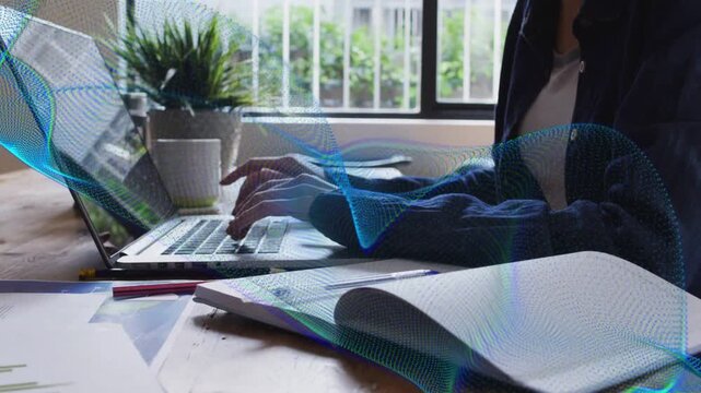 Woman typing triggers blue-green wave graphic sweeping over laptop, hands, notebook for study