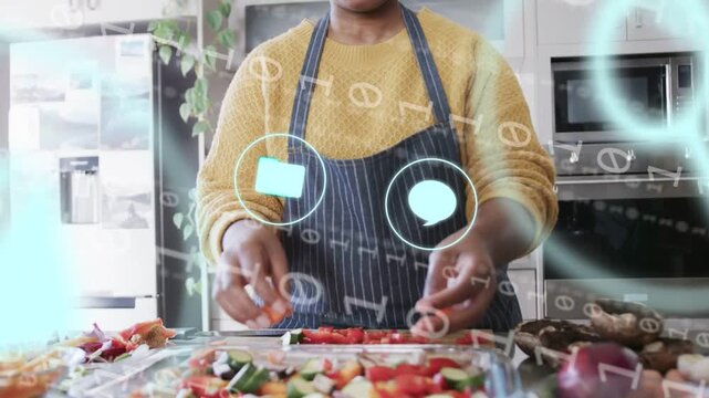 Home cook arranging veggies on tray in kitchen, holo camera and phone icons appearing guiding prep