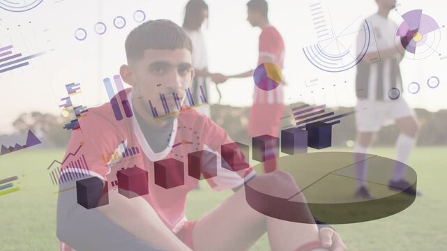 Seated soccer player reacting to others moving and covering face while charts scaling over torso