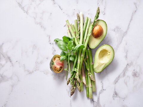 Fresh vegetables on marble countertop for home meal prep